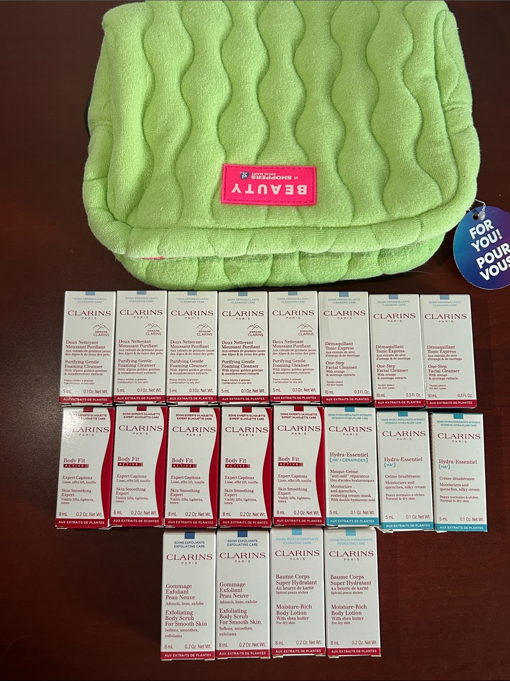 20 pieces Clarins Assorted Skincare Samples with Lime Green Quilted Pouch
